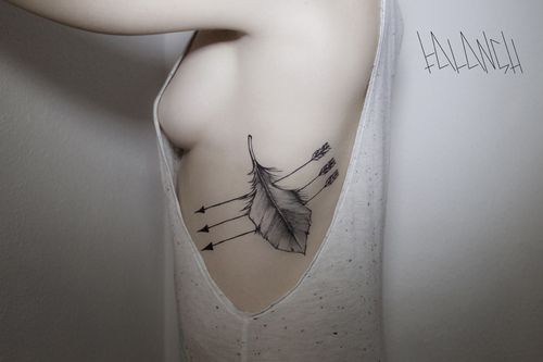 Arrow tattoo landscape composition