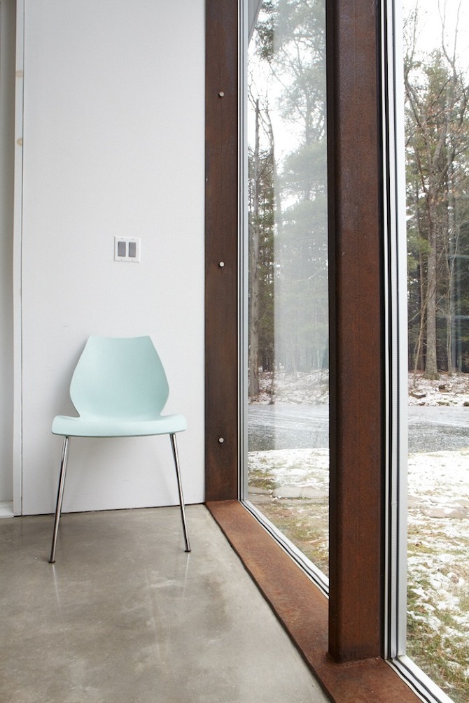 Kitchen and glazed wall overlooking the creek