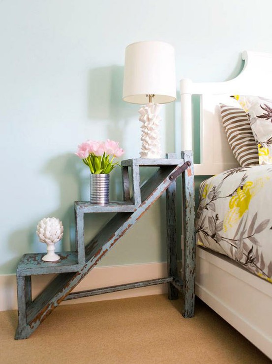 Step ladder used as a bedside nightstand