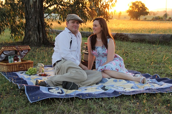 Wide picnic engagement landscape with couple