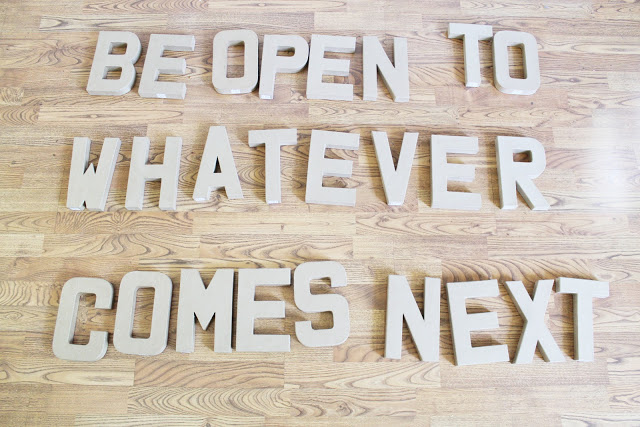 Three-dimensional quote letters on a wall
