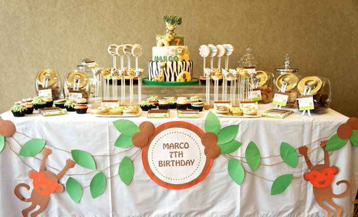 Jungle party table and canopy decorations