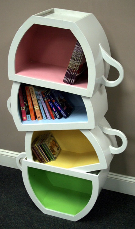 Stacked teacup-shaped bookshelf with colored interiors