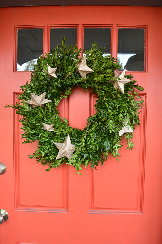 Metallic star and greenery wreath