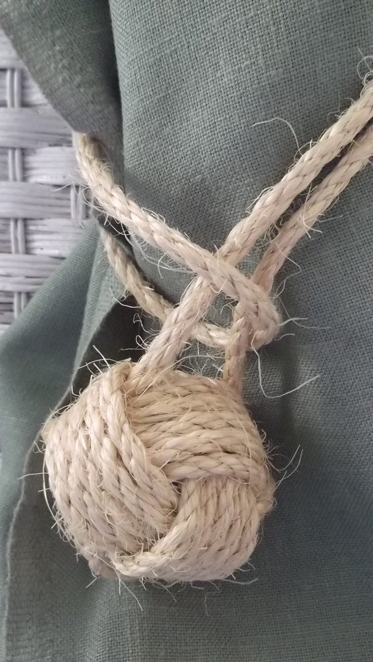 Elegant curtain holdback with cord