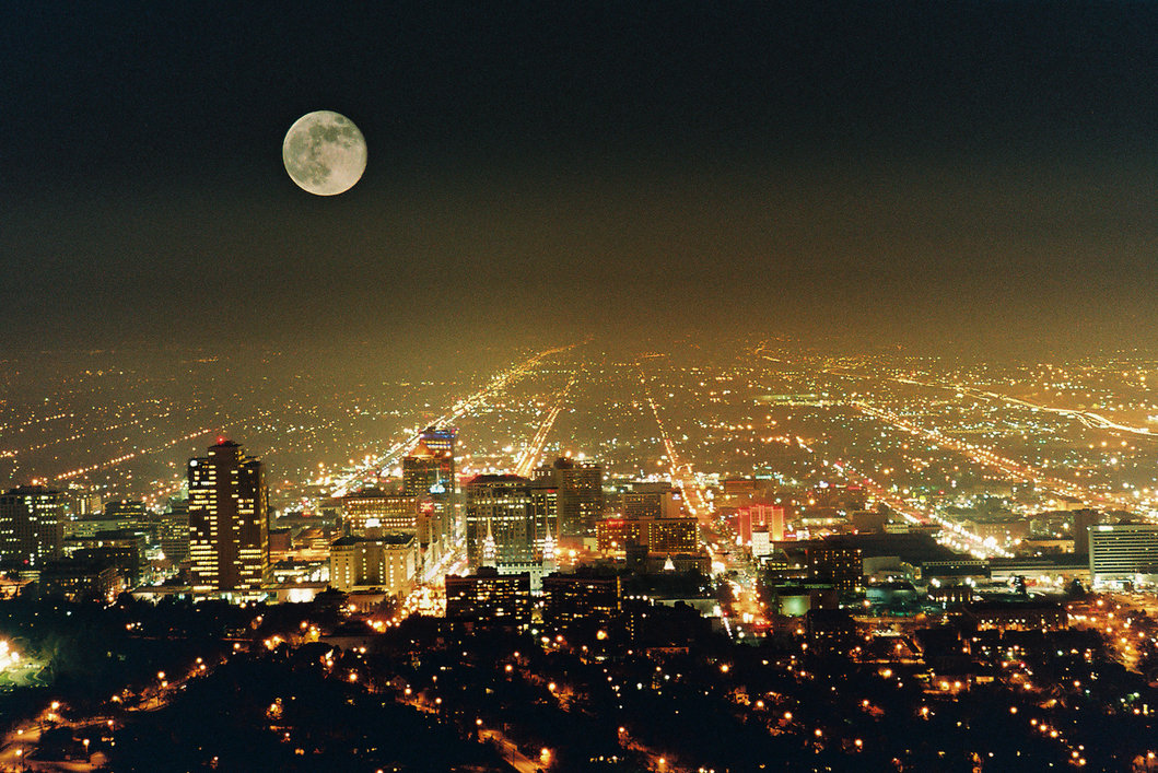 DezRay City lights spreading across a wide night landscape