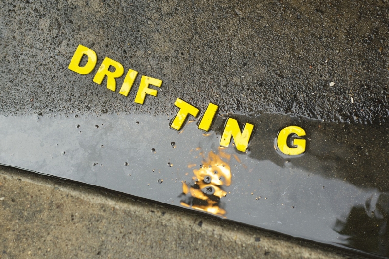 Close view of adhesive letters on discarded items