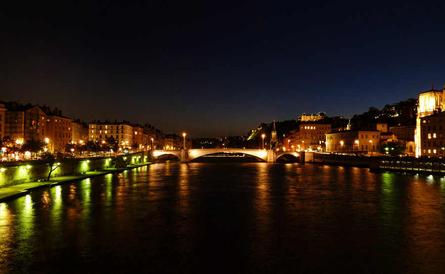 aramis2288 City nightscape with warm building lights and dark sky