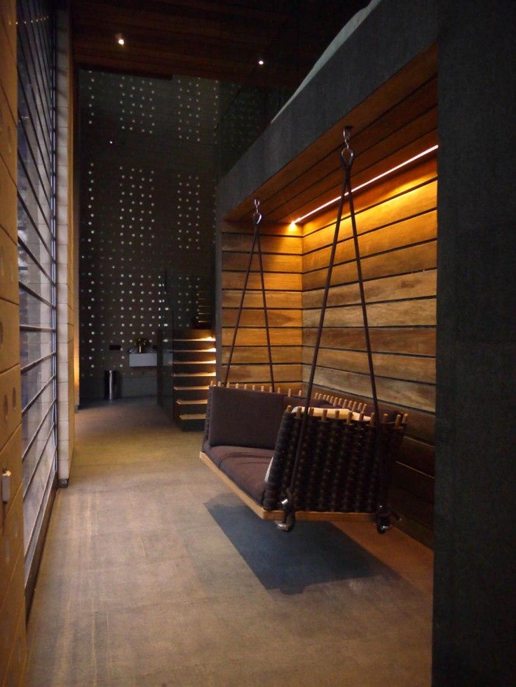 Indoor swing with cushions
