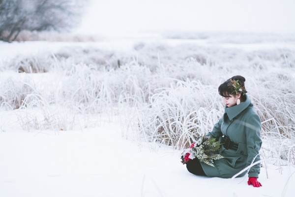 Couple walking or posing in a holiday engagement setting
