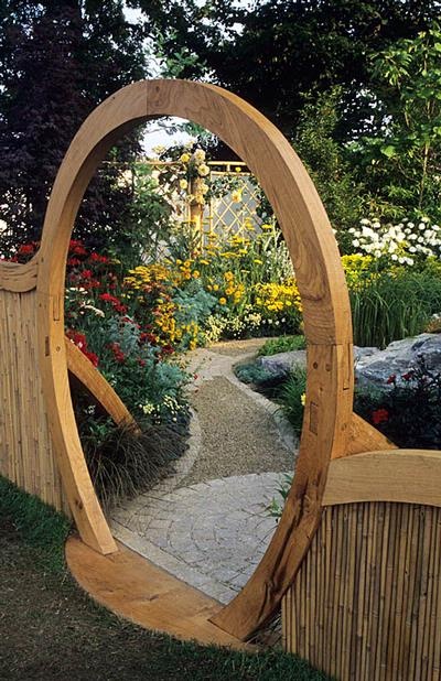 Garden gate with curved top