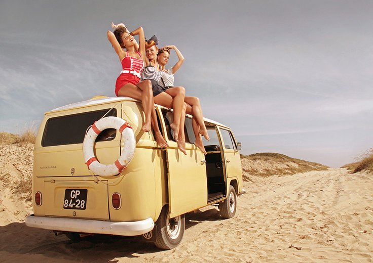 Wide retro beach view with classic summer leisure