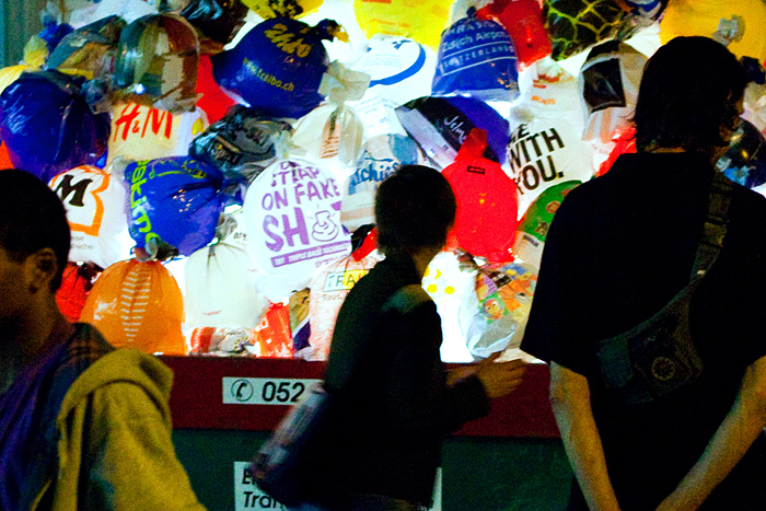 Night view of Luzinterruptus plastic bag lighting installation