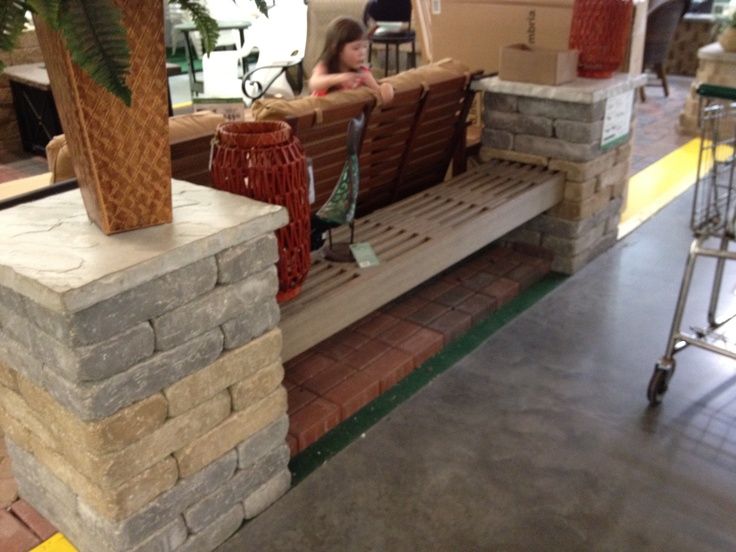 Curved outdoor seating with soft cushions