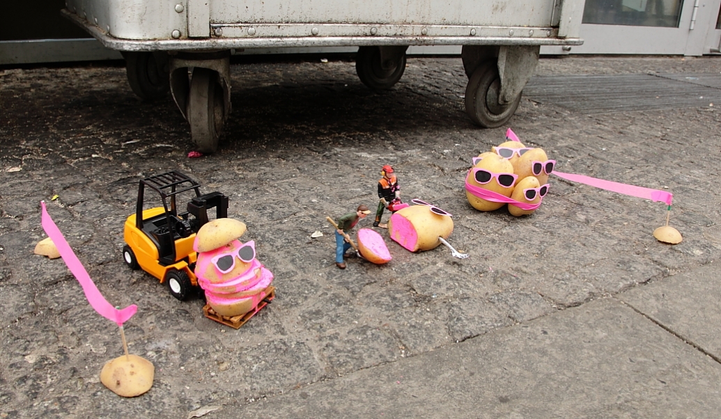 Wider scene from Peter Pink's potato walkout series