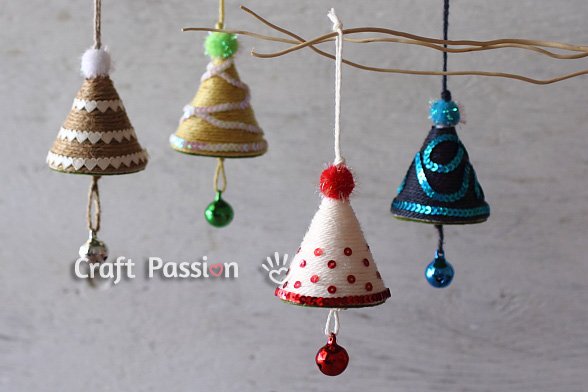 yarn wrapped bell ornaments with sequins and jingle bells