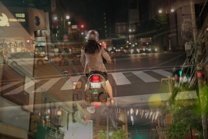 Multiple exposure with pedestrian and night traffic glow