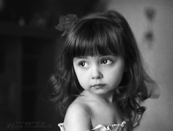 Candid child photography by Maria Gvedashvili
