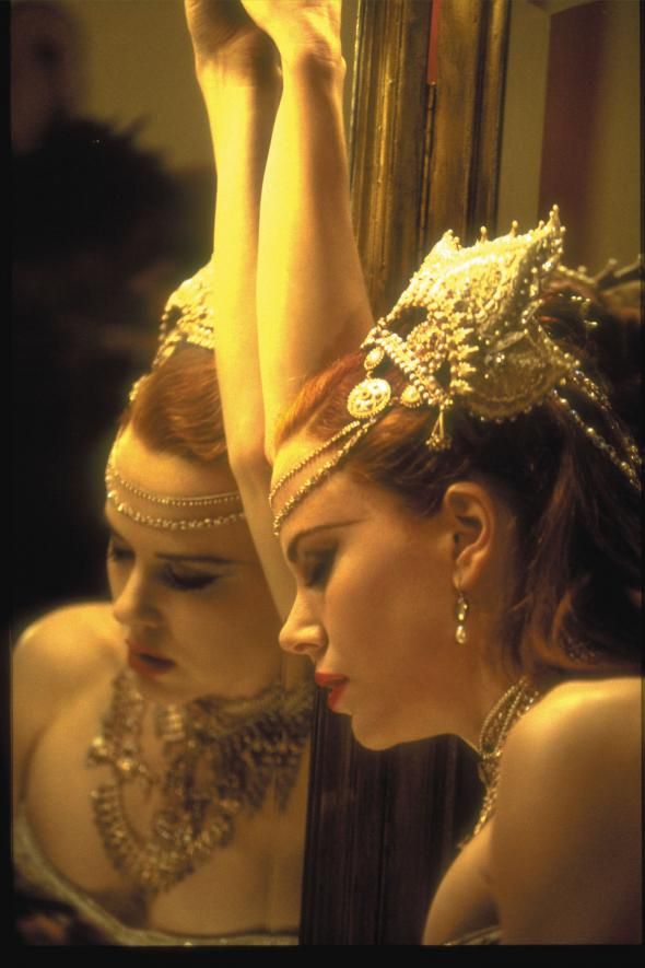 Mirror portrait with soft focus and intimate framing