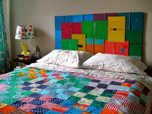 Headboard made from colorful hardcover books