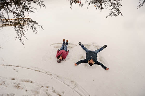 Holiday engagement session frame with winter styling