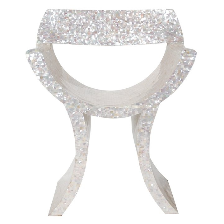 Sculptural chair clad in iridescent mother-of-pearl mosaic
