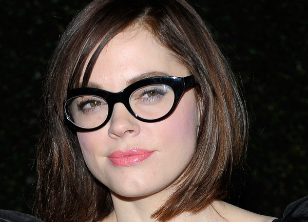 Public figure wearing statement frames