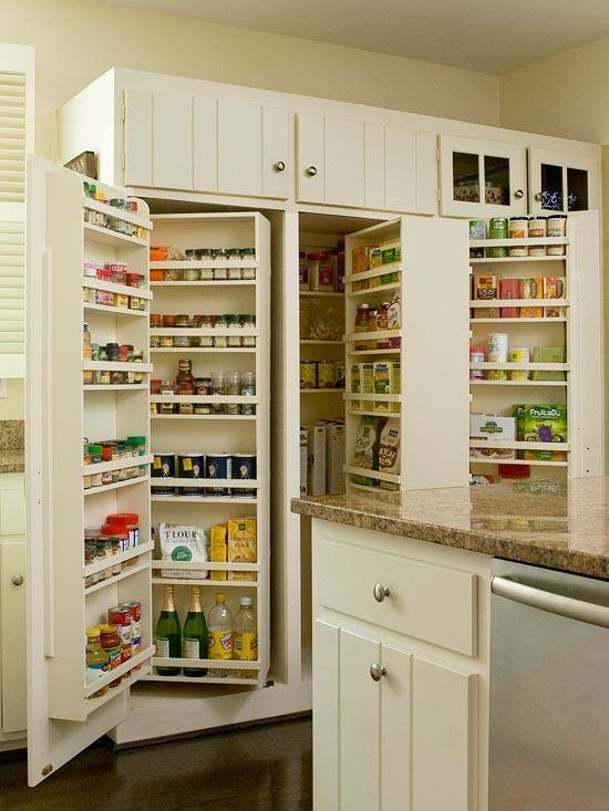 Kitchen pantry design with uniform canisters on open shelves