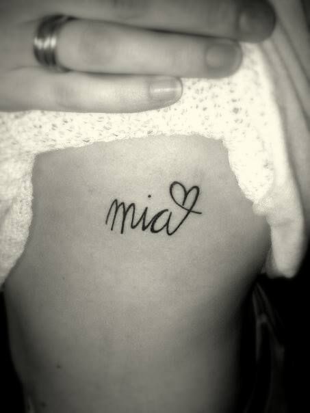 Tiny rib tattoo trio