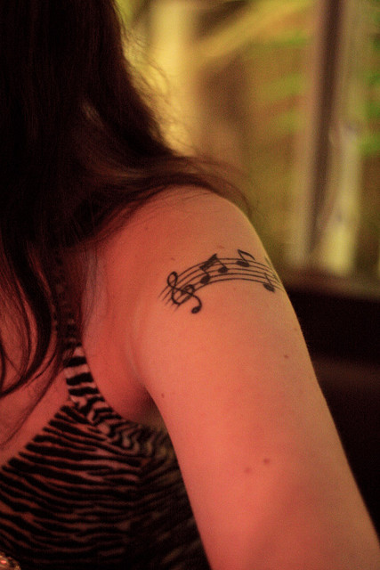 Floral music hybrid tattoo