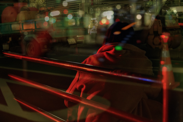 Urban night multiple exposure with glowing signs