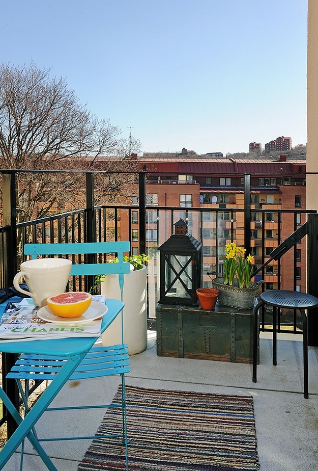 Balcony with railing planters and seating