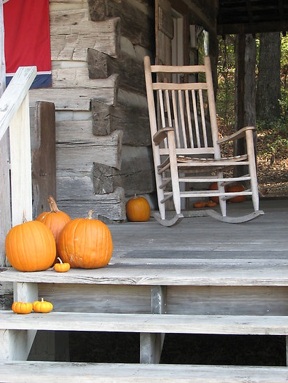 Fall porch with mums and foliage