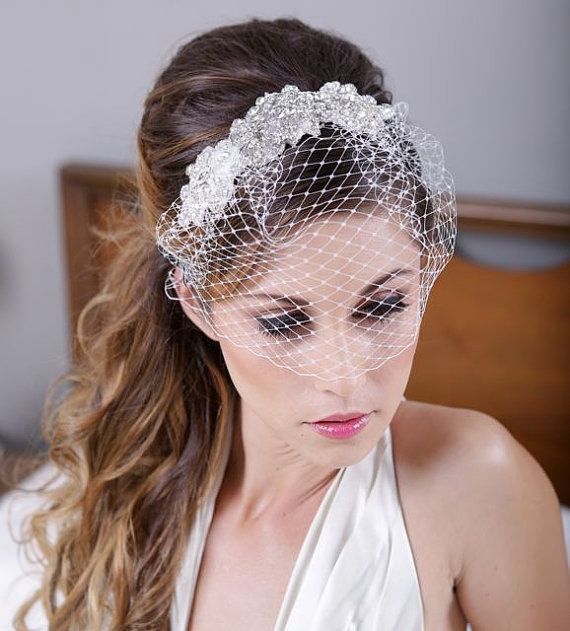 Soft bridal portrait with birdcage veil