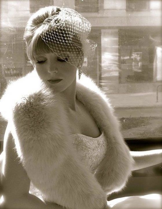 Stylish bride in a birdcage veil