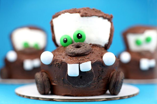 Mater from Cars cupcakes with cookie wheels and candy eyes