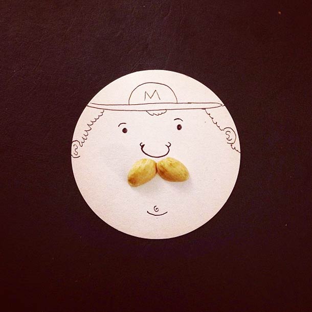 Mario-style face with pistachio shells as a mustache