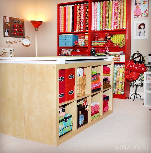 Organized craft supplies on shelves