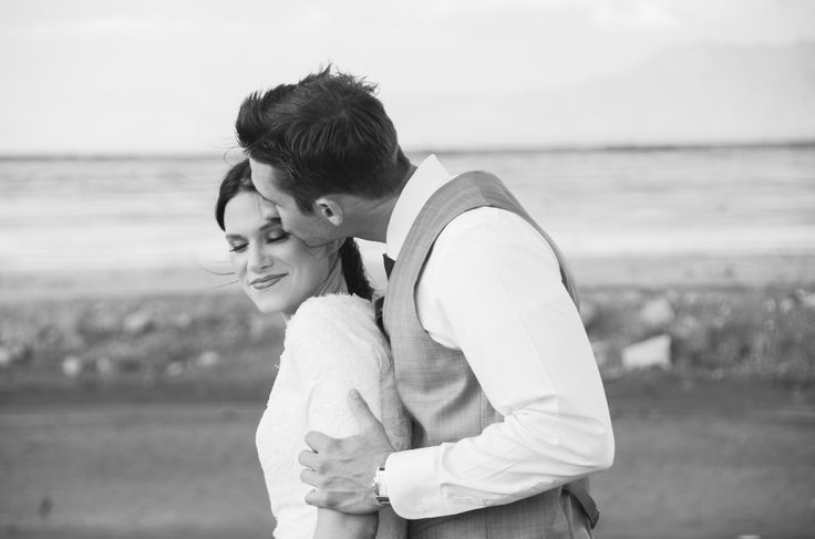 Black and white wedding couple smiling