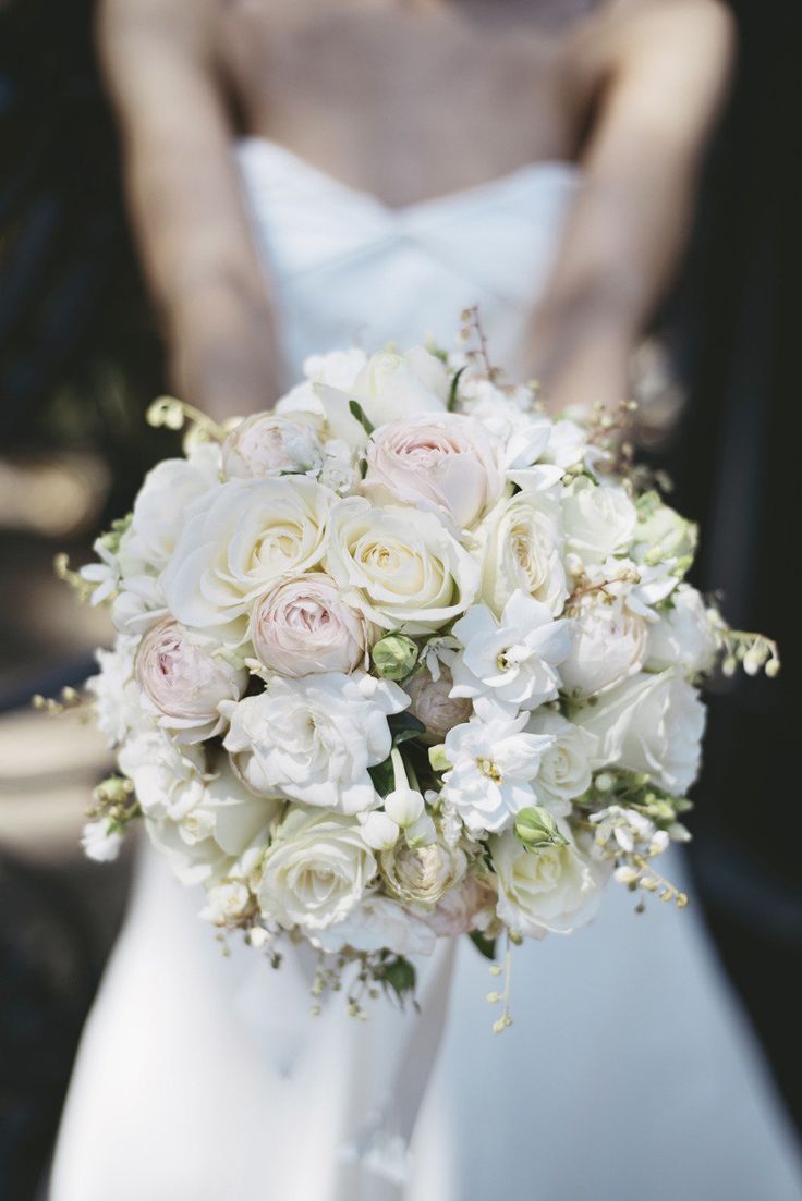ivory roses and blush ranunculus bridal bouquet