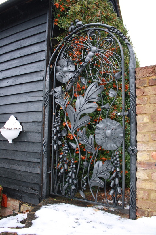 Narrow garden gate in a fence line