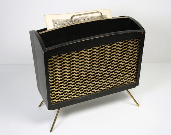Magazine rack placed beside seating