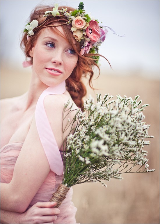 Twig and flower crown with peach roses and pink anemone in a golden field