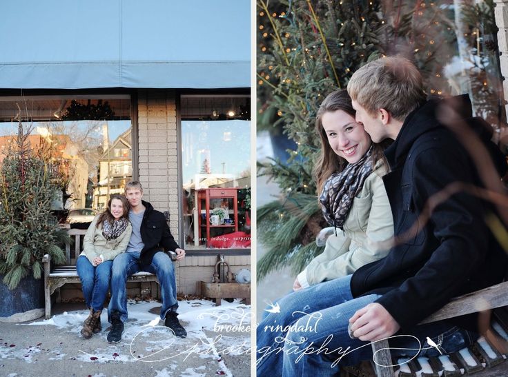Holiday engagement couple among evergreens