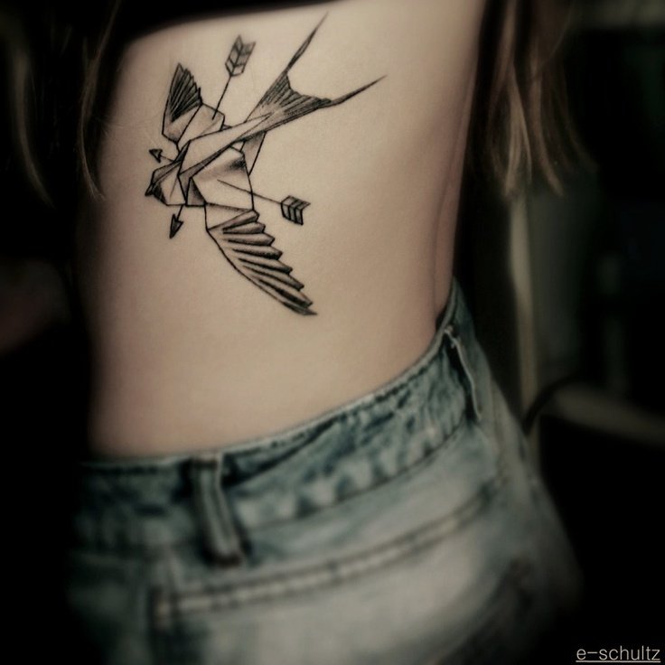 Bold arrow tattoo design