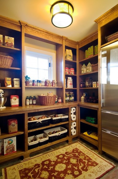 Compact pantry organization with door racks and tight shelving