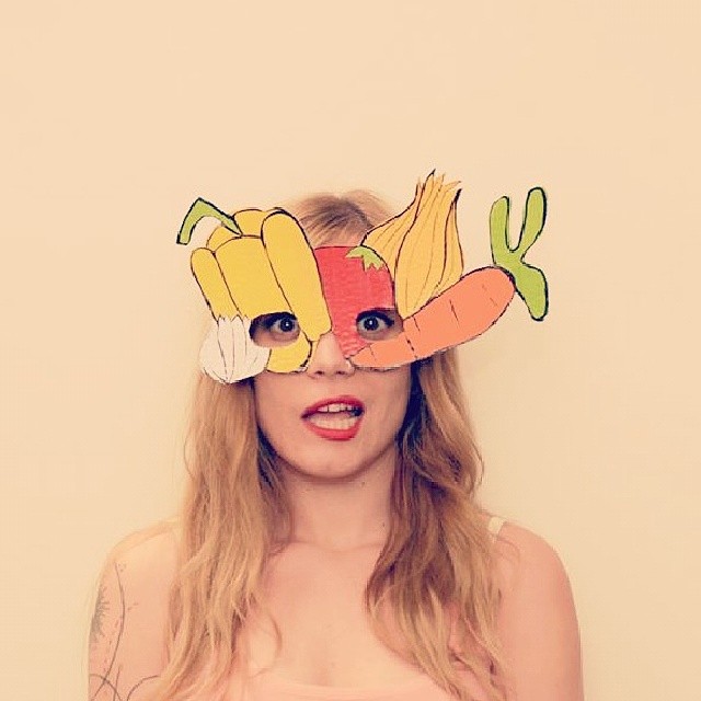 Vegetable collage cardboard mask with pepper garlic and carrot