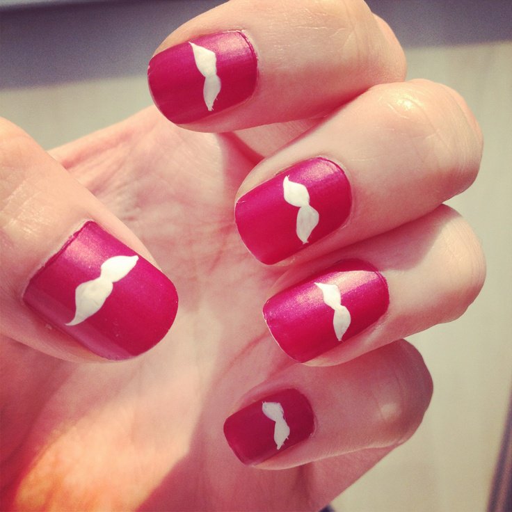 Mustache themed manicure close-up