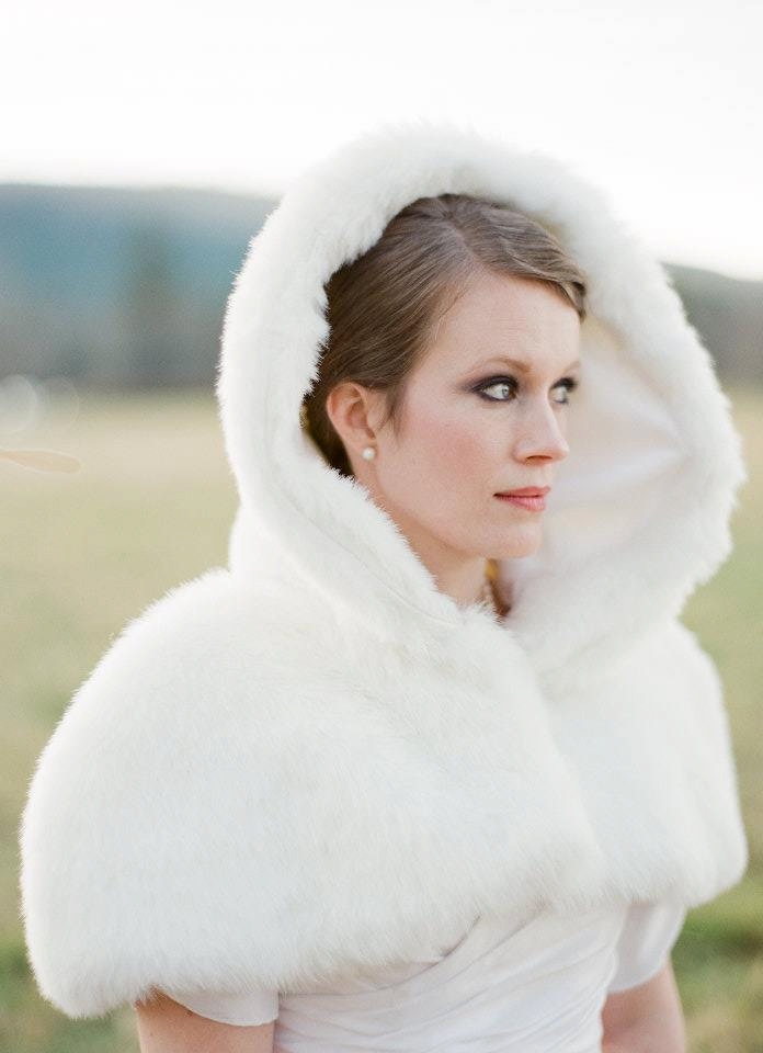 Floor-length wedding cloak detail