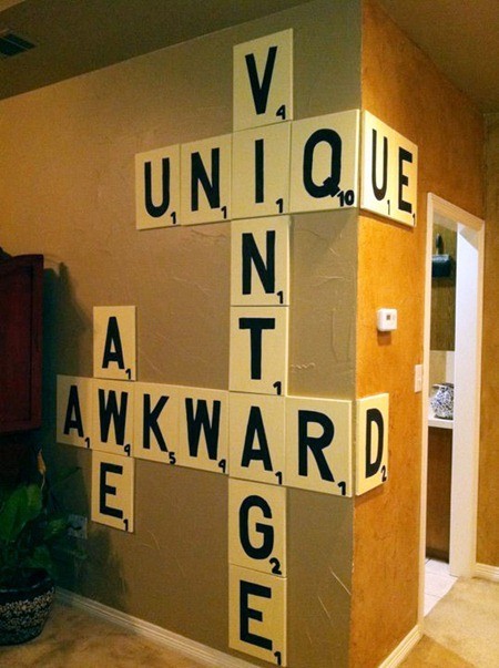Oversized Scrabble-style wall tiles spelling intersecting words
